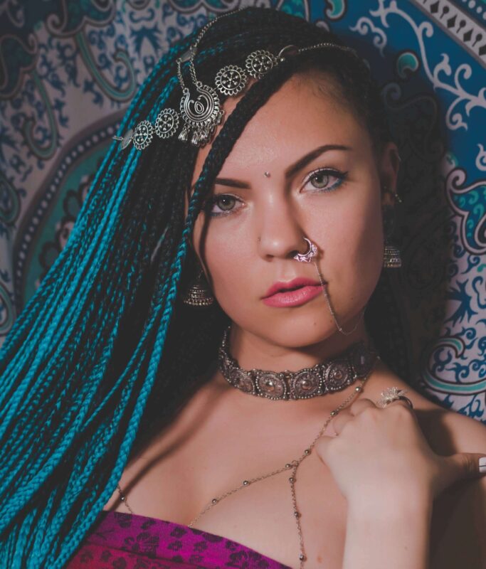 portrait-of-young-beautiful-woman-with-blue-kaneka-2023-11-27-05-35-38-utc (1)
